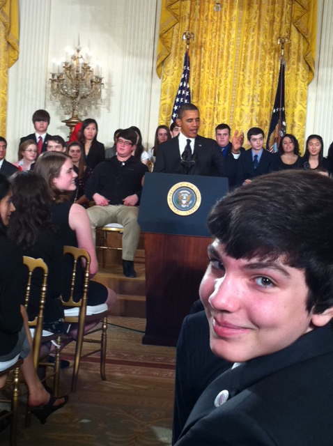 Society alumnus Benjamin Hylak listens to President Obama’s speech