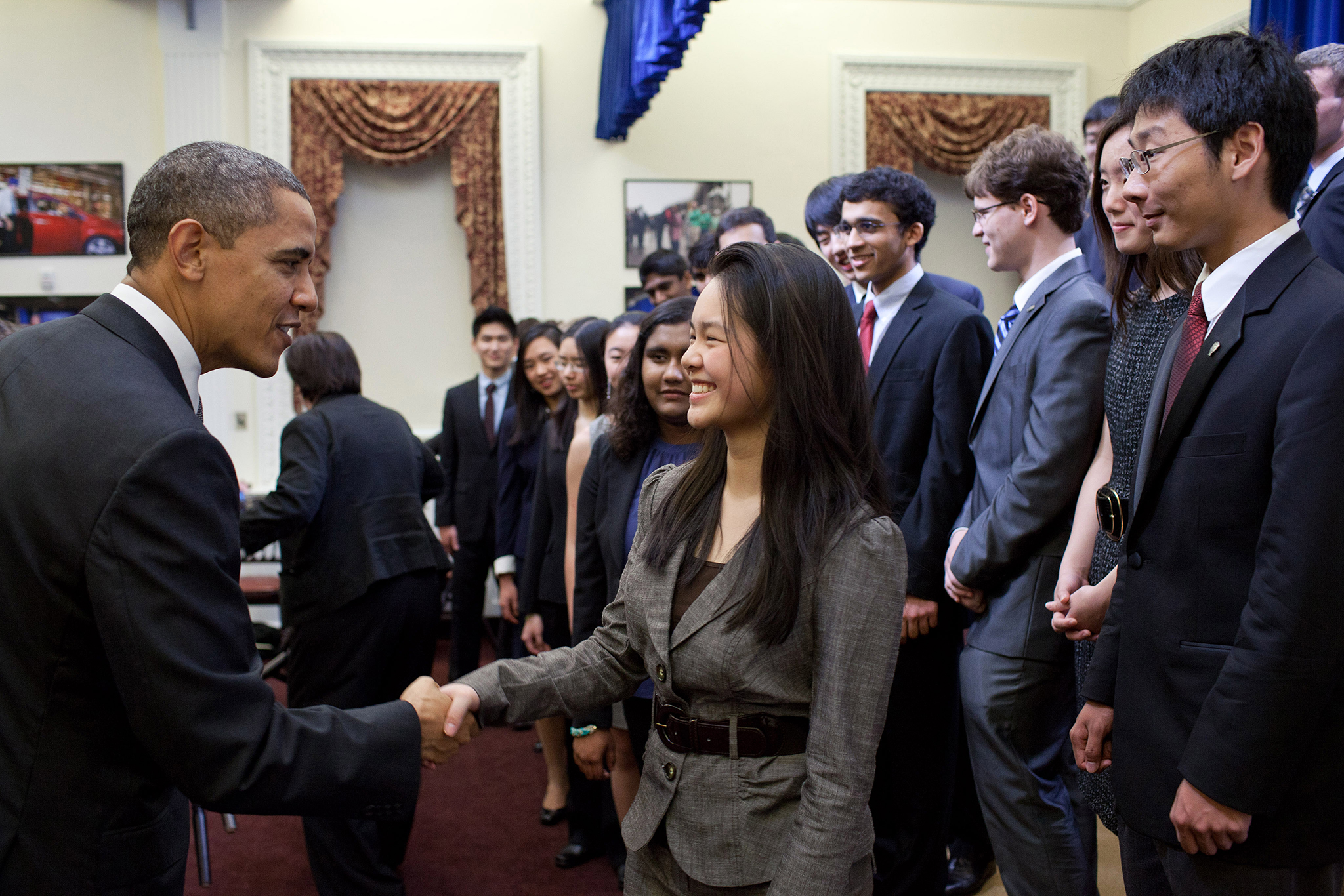 STS finalist Anna Sato shakes hands with President Obama