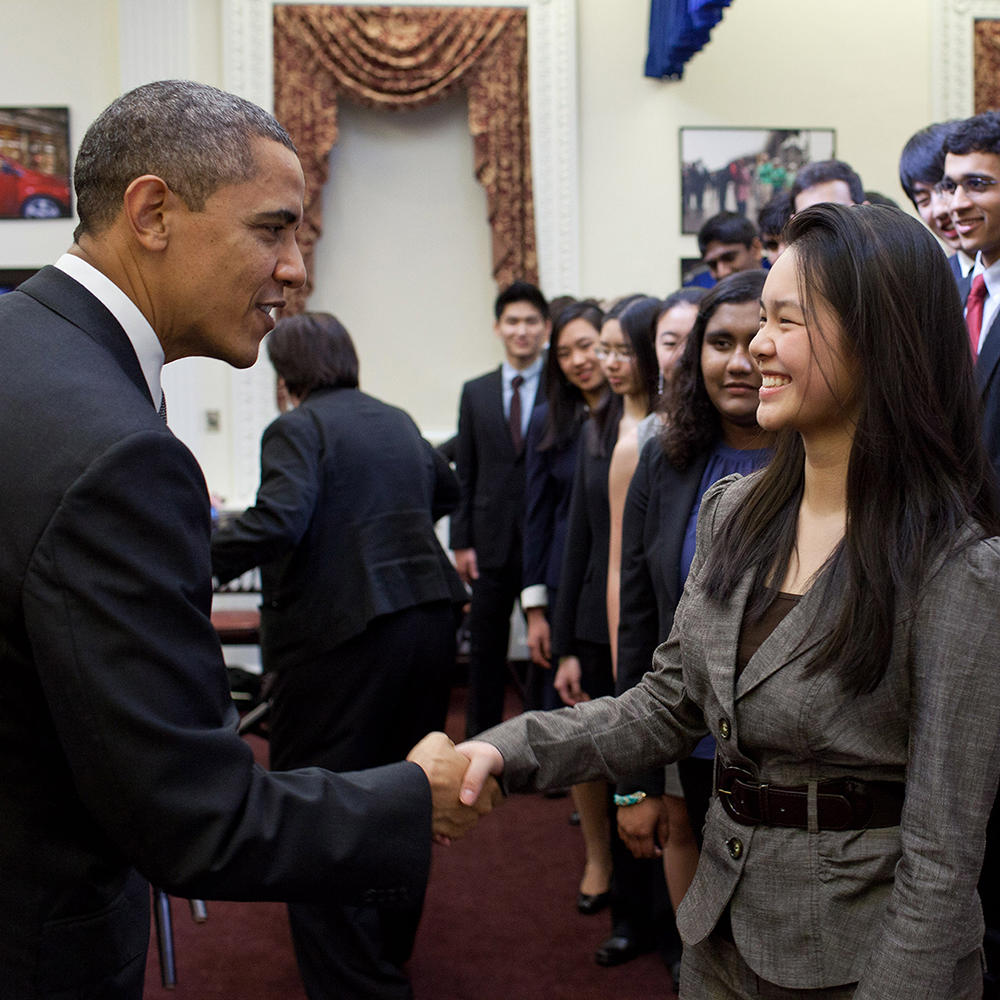 STS finalist Anna Sato shakes hands with President Obama