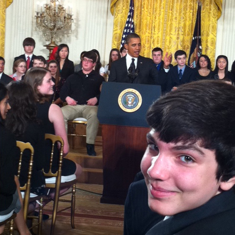 Society alumnus Benjamin Hylak listens to President Obama’s speech