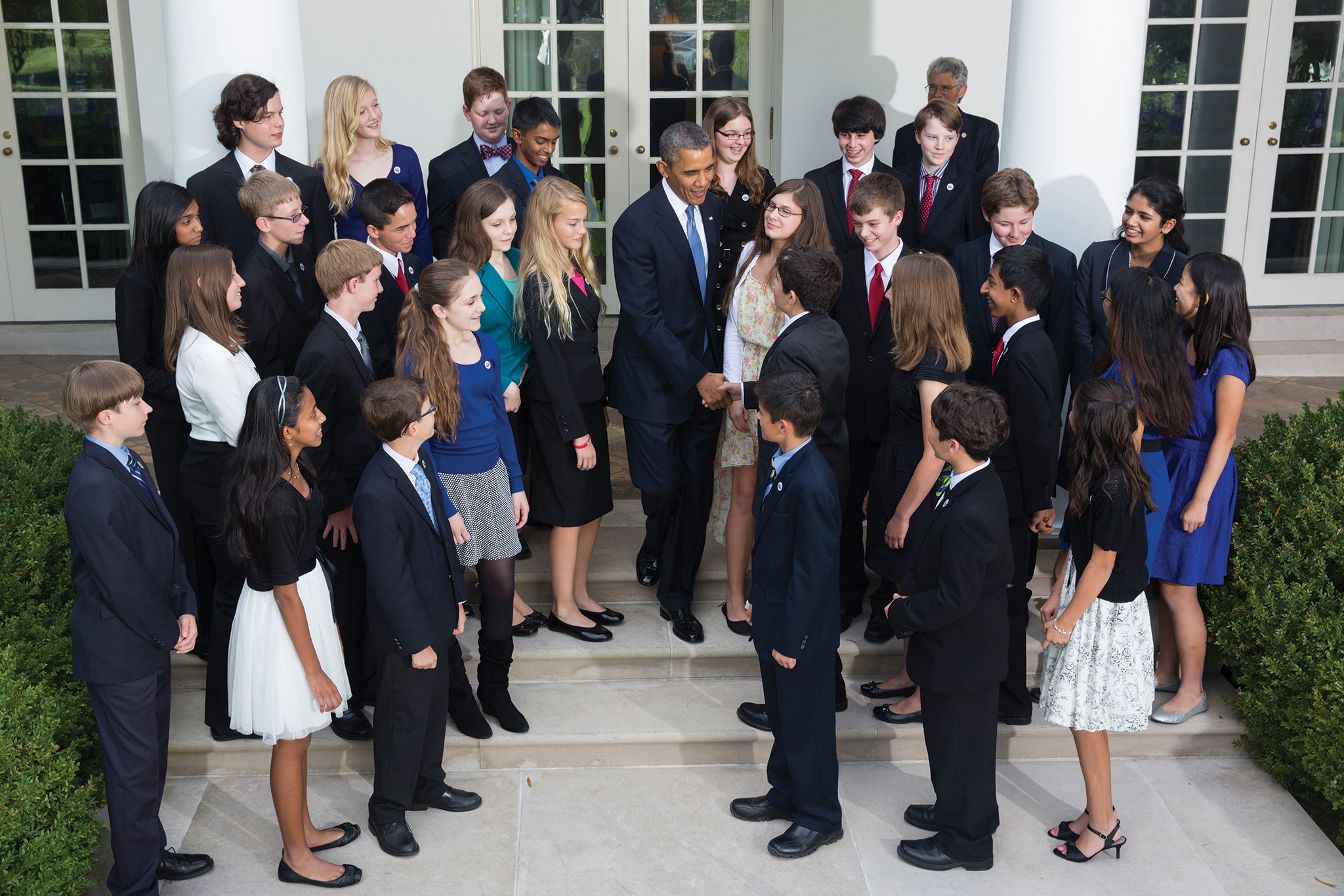 President Obama shakes hands with Broadcom MASTERS top winner Austin McCoy