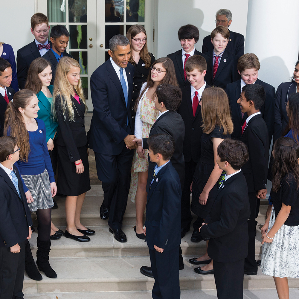 President Obama shakes hands with Broadcom MASTERS top winner Austin McCoy