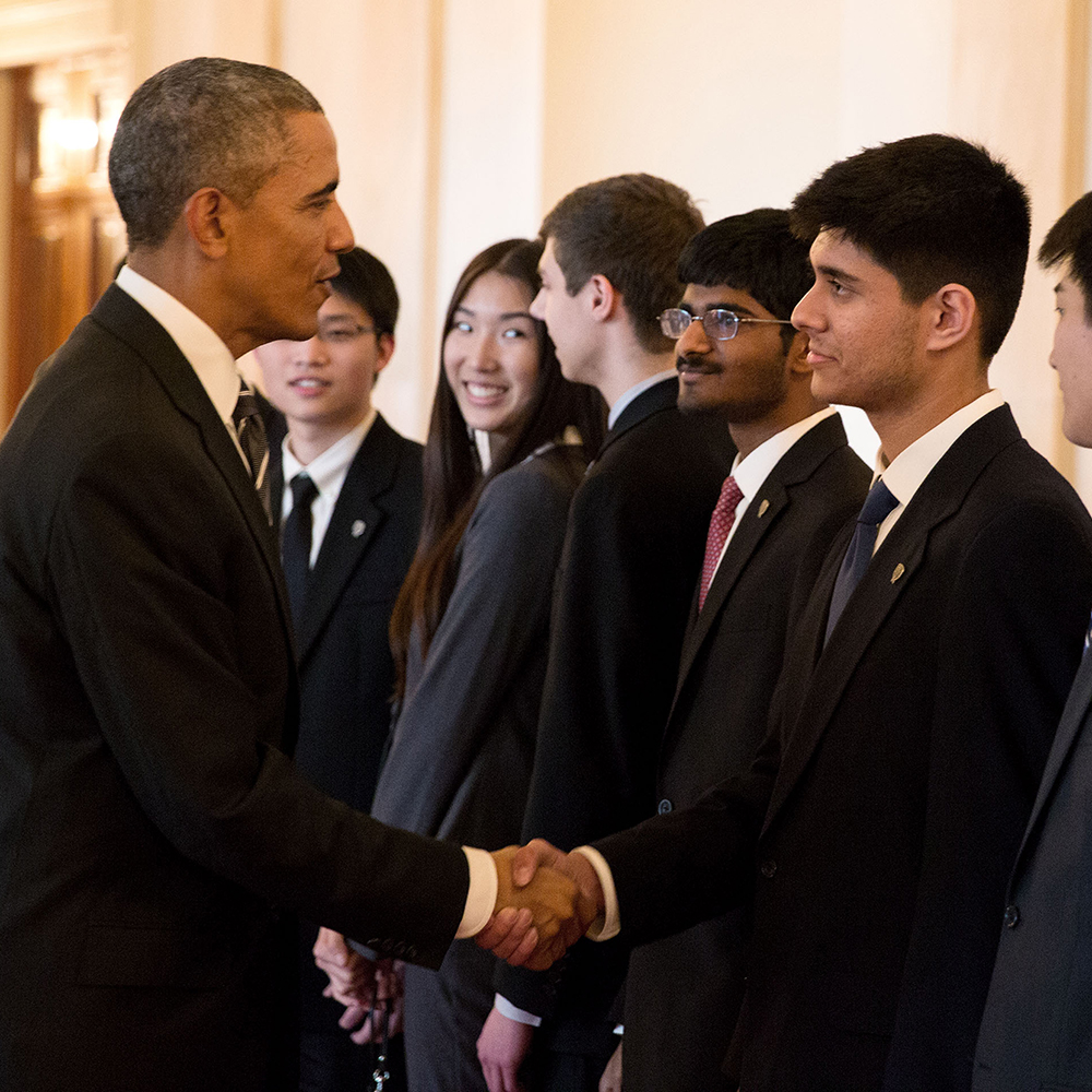 President Obama shakes hands with STS finalist Tanay Tandon