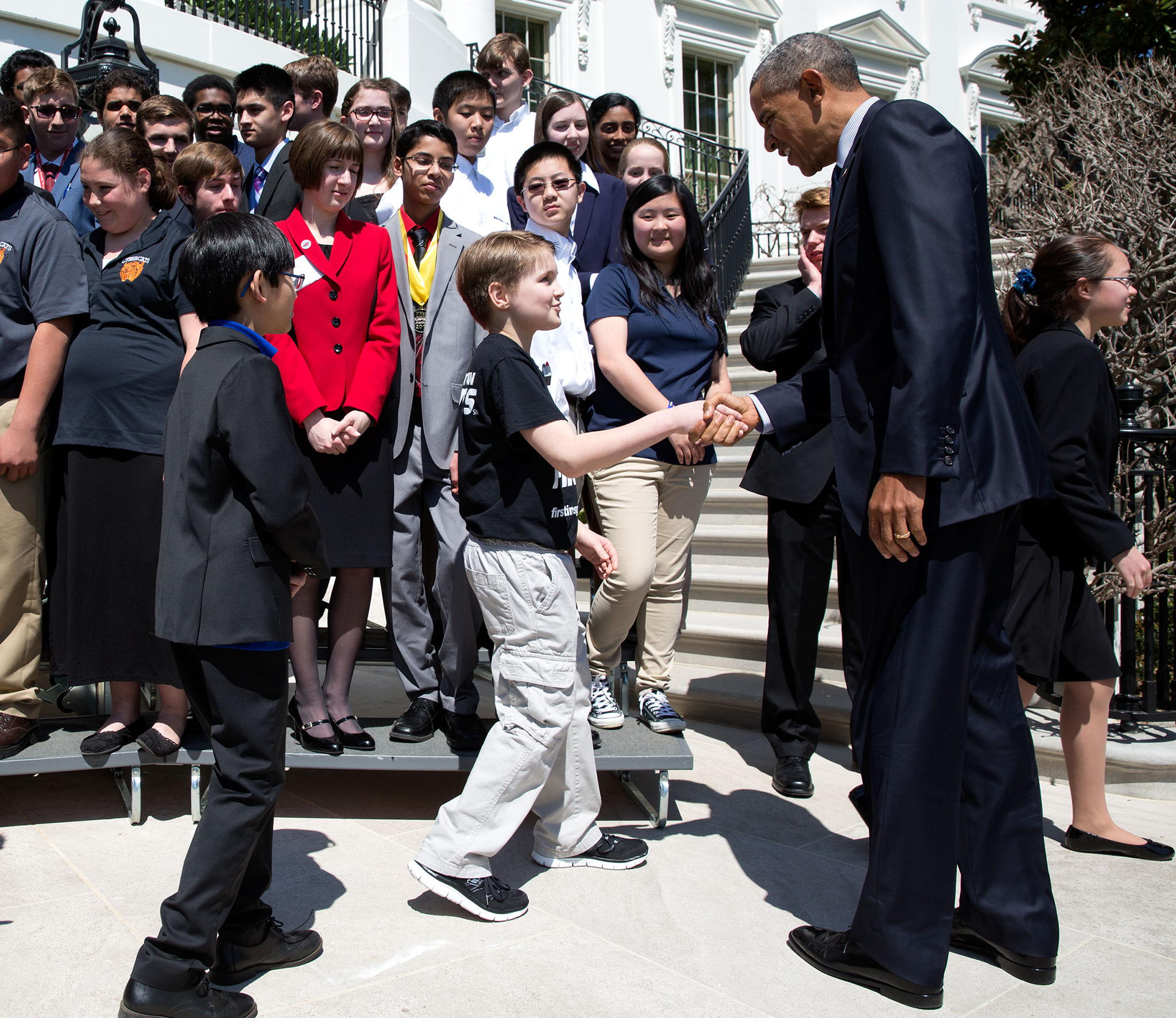 President Obama shakes hands with White House Science Fair participants