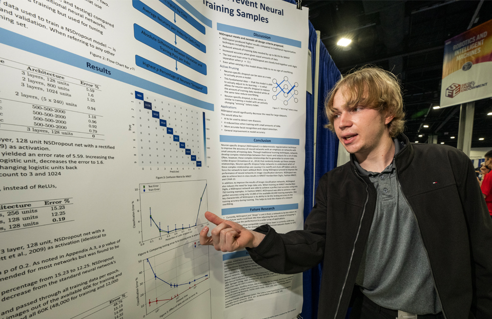 2023 STS Finalist Joshua Shunk with his project at the 2022 ISEF in Atlanta