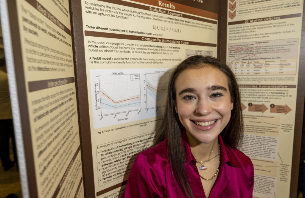 2023 Regeneron STS Finalist Emily Ocasio at the public exhibition of projects