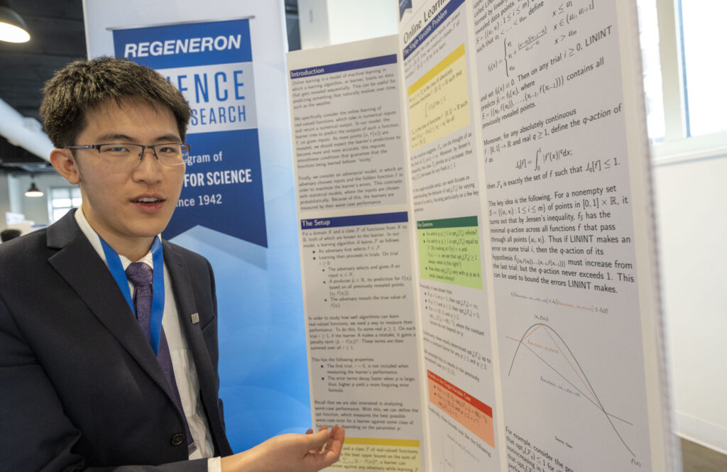 2023 Regeneron STS Finalist Ethan Zhou at the public exhibition of projects