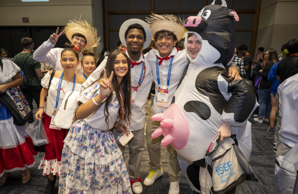 2023 Regeneron ISEF finalists from Puerto Rico (left) and North Dakota (right) pose for a photo during the pin exchange.