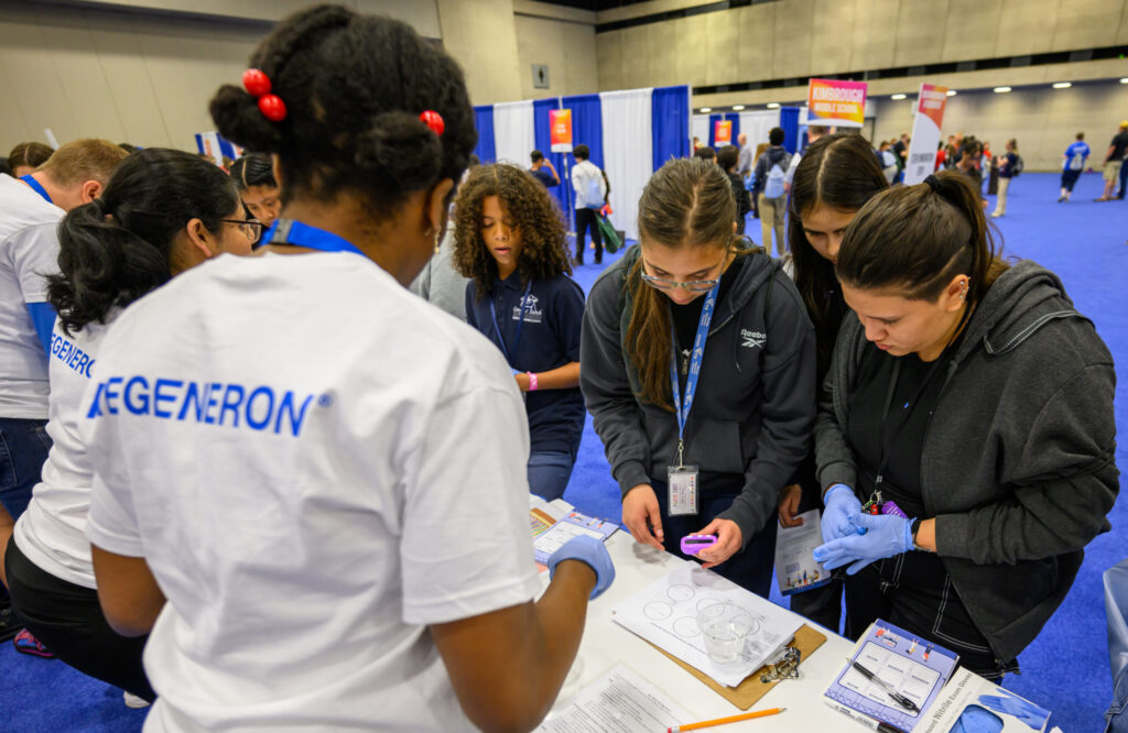 Students perform an experiment at Ed Outreach Day at Regeneron ISEF 2023.