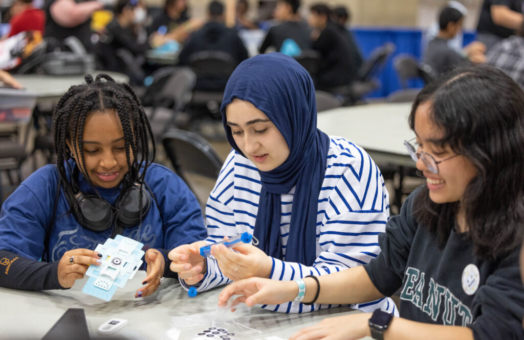 Students use scientific equipment at the Device Discovery Zone during Ed Outreach Day at Regeneron ISEF 2023.