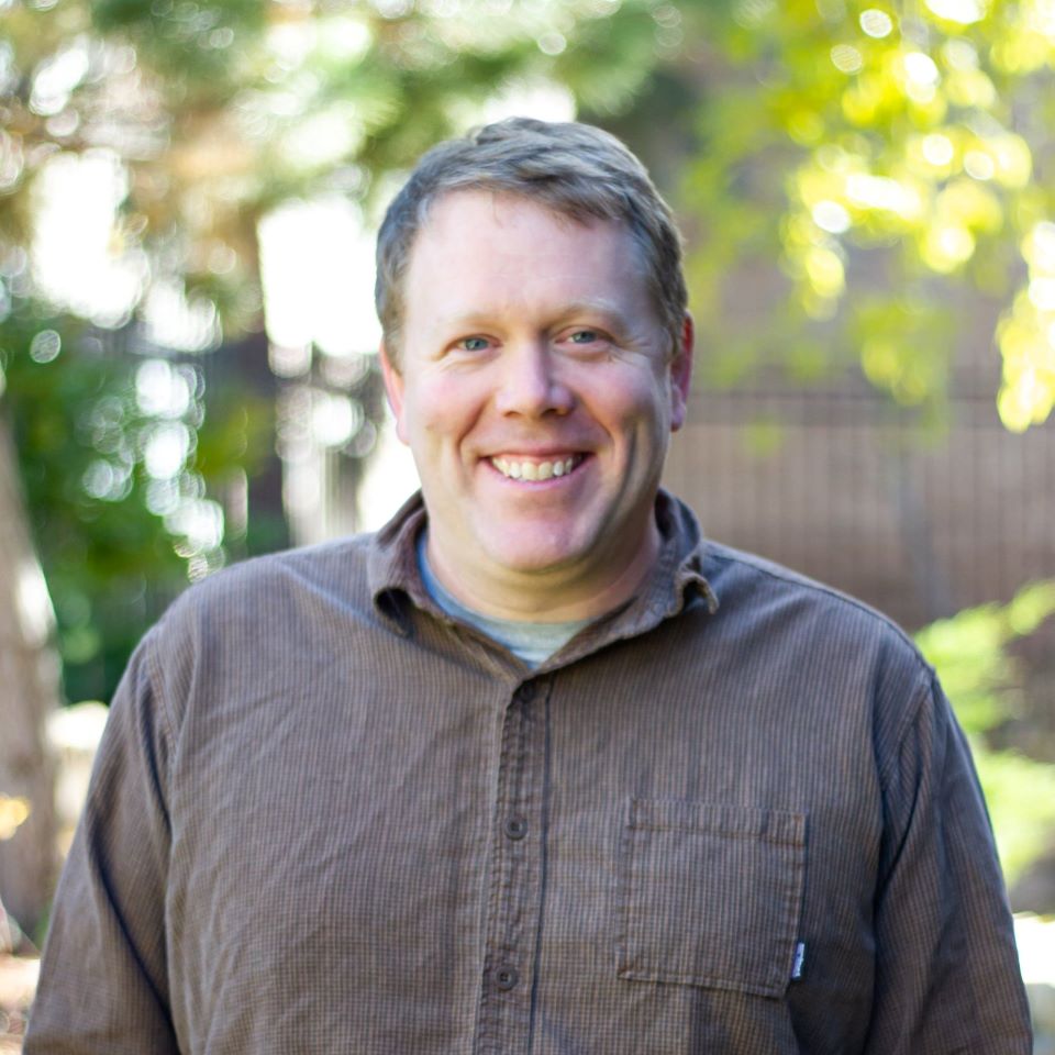 Ron Sutherland poses for a headshot.