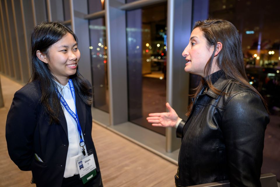 Hayley Bay Barna speaks with a finalist.