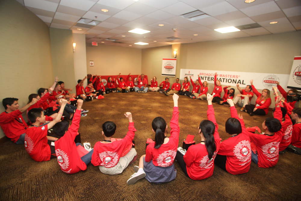 Broadcom MASTERS International delegates finish out the week with a celebratory cheer.