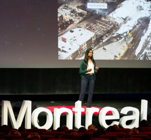 Nivatha speaking at TEDxMontreal Women in July. Photo by TEDxMontrealWomen2015.