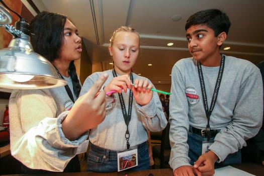 Sidor and her partners work together to complete the BCM team challenge