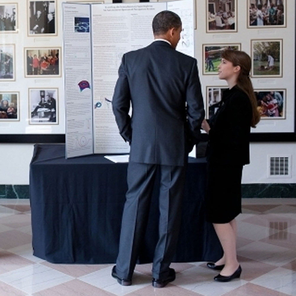 Erika DeBenedictus discusses her research with President Obama