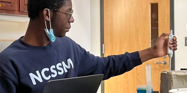 Oziomachukwu Obi 2023 STS Finalist working on his project