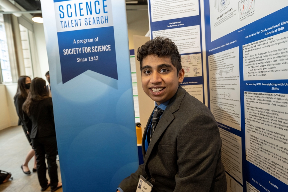 Neal Moudgal at his project board, Regeneron STS 2023, Science Talent Search, project, public day