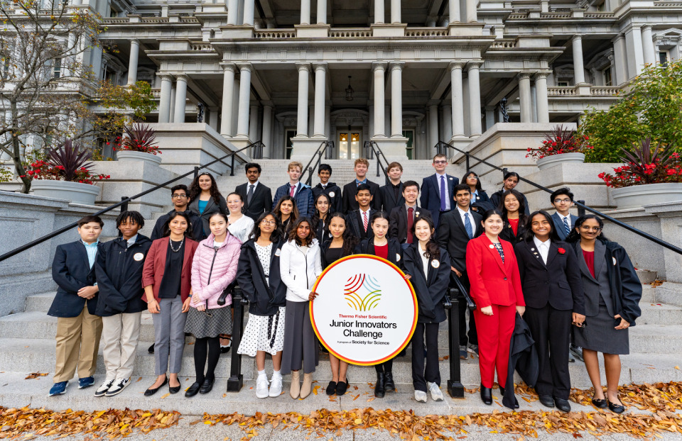 2023 Thermo Fisher Scientific Junior Innovators Challenge finalists on the steps of the Eisenhower Executive Office Building after visiting the Office of Science and Technology Policy at the White House.