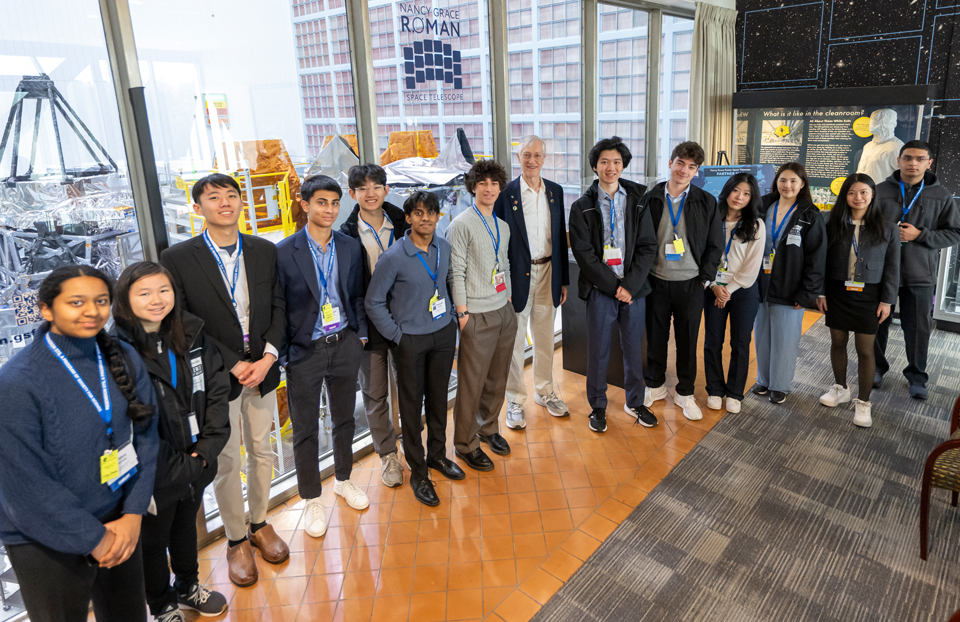 Group of 2025 STS finalists are posed around John Mather, Nobel Laureate and senior astrophysicist at NASA Goddard.