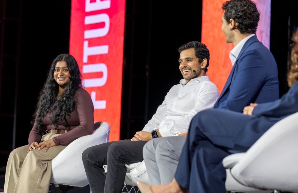 Panelists on stage at the Innovation, Entrepreneurship and Impact Panel