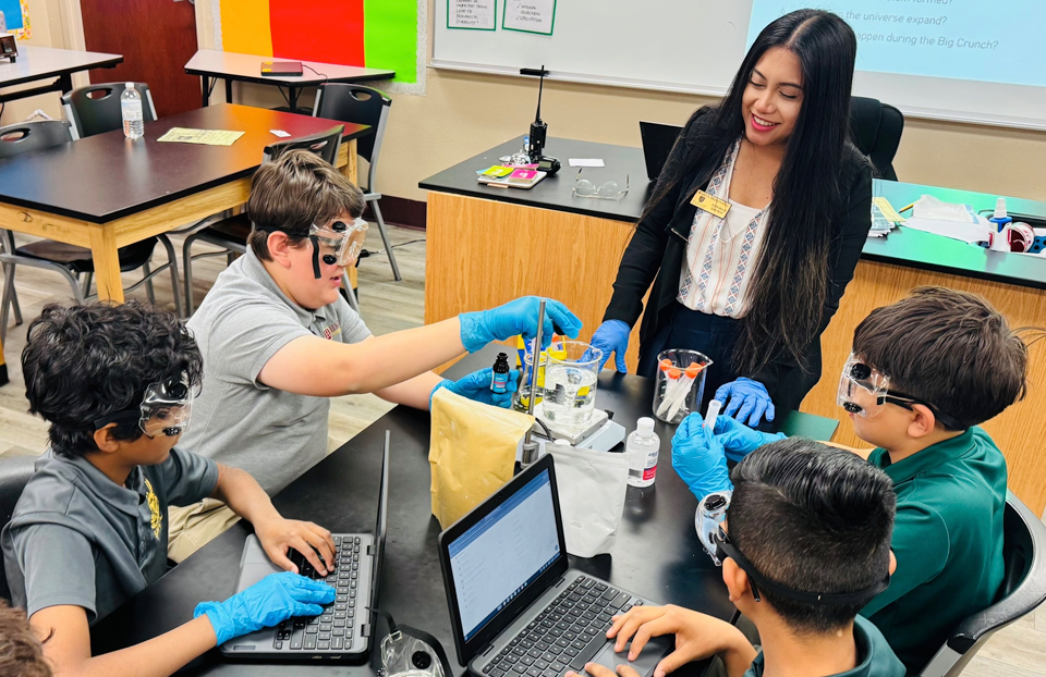2025 Advocate Grants announcement - teacher Karen Maninang with students at Harvest Preparatory Academy in Yuma, AZ