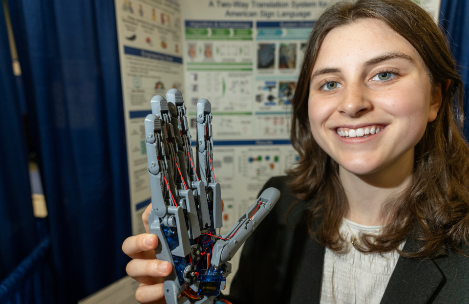 ISEF 2025 Finalist TECA010 Ana Spiride with their invention.