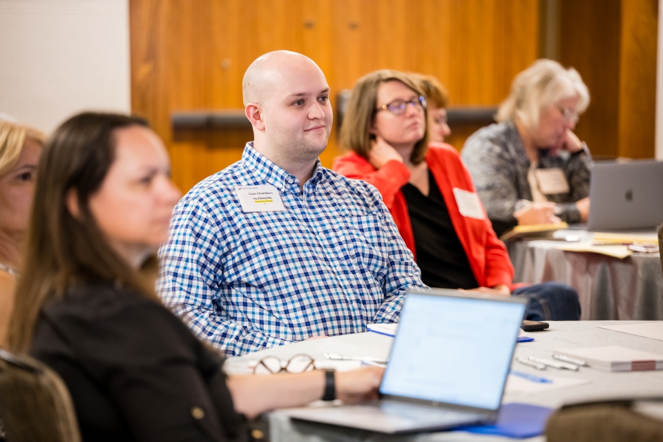 Liam Chambers pictured sitting with teachers at the Society's Research Teachers Conference