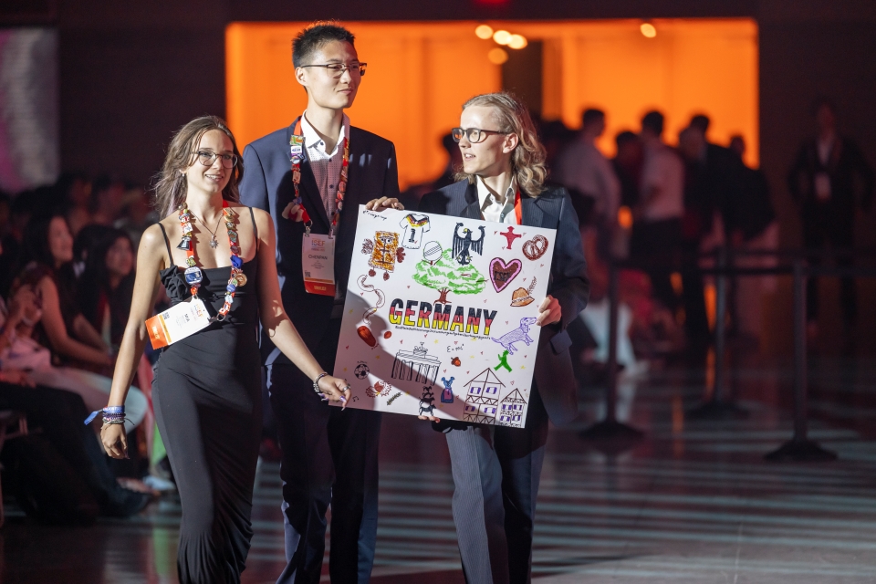 ISEF finalists from Germany hold their country sign