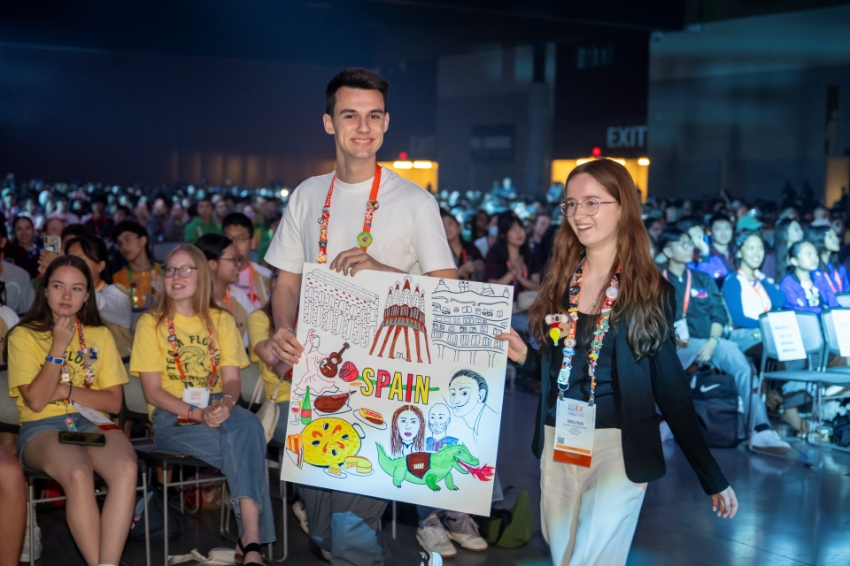 ISEF finalists from Spain hold their country sign